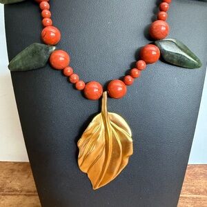 Robert Lee Morris Brass Leaf and Red Botanical Green Stone Leaf Necklace